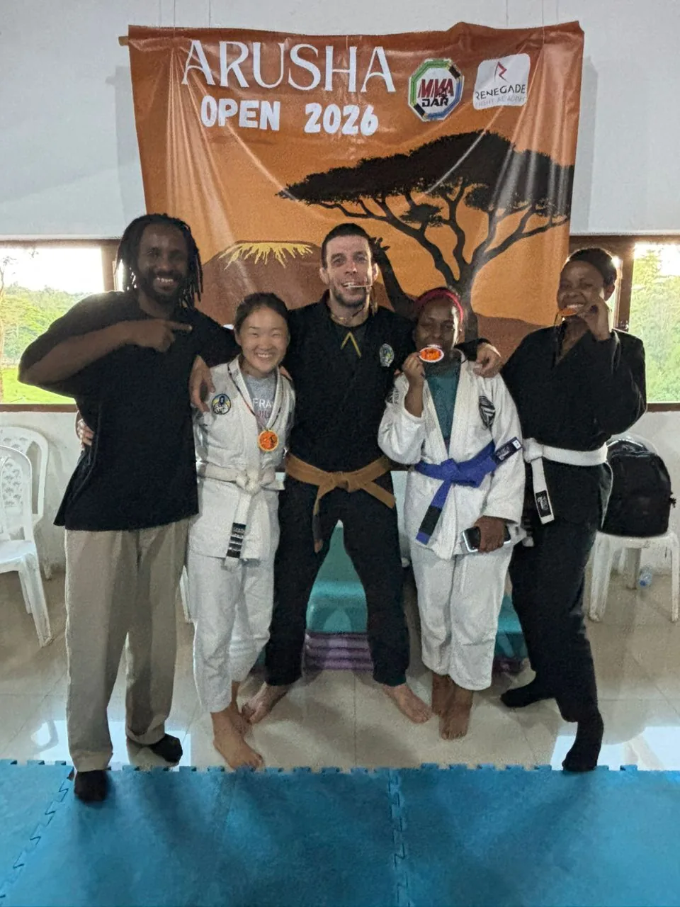 Kigali BJJ competitors holding medals at the Arusha Open 2026