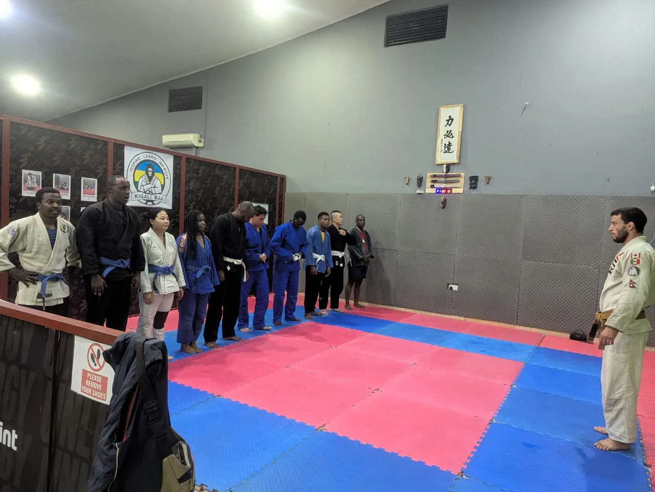 Learning from the coach at Kigali BJJ