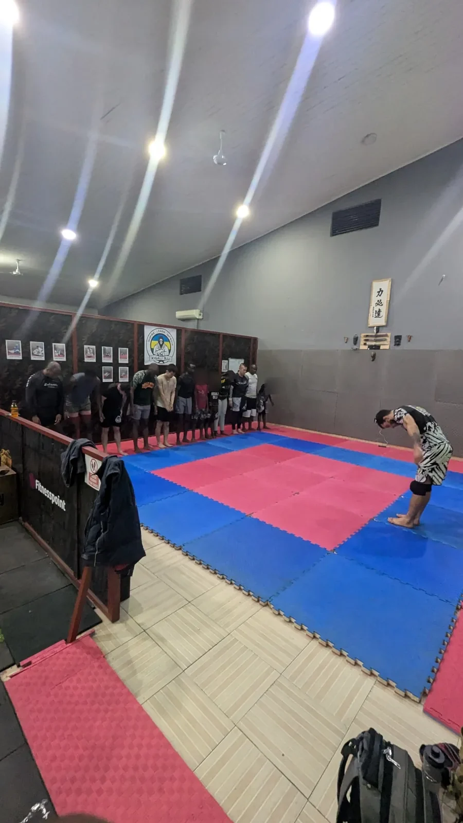 Kigali BJJ students training during an evening class