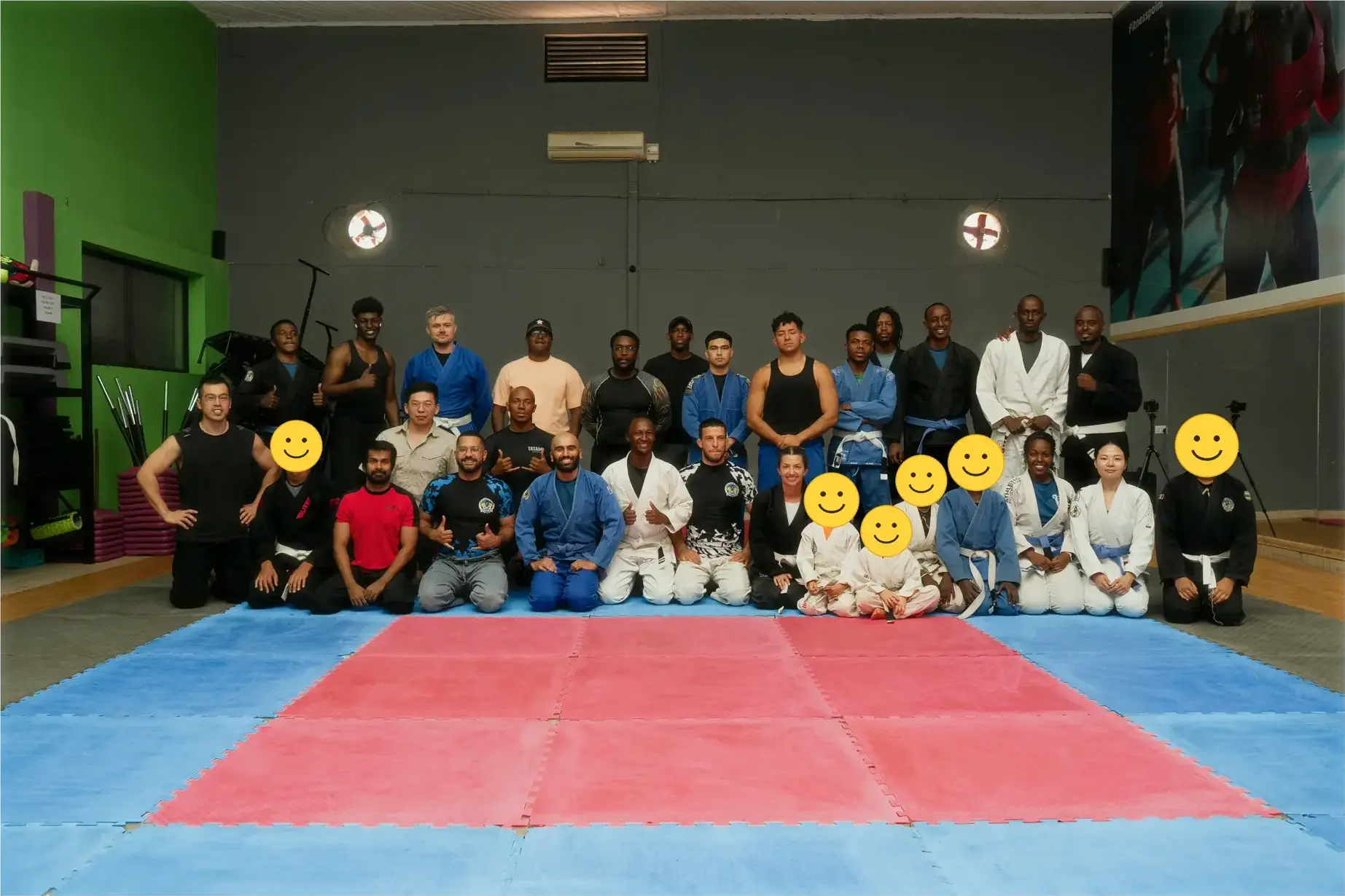 Kigali BJJ members and coaches together on the mats
